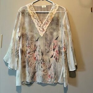 180 degree sheer top. This is a pale yellow and green. Size ? L see measurements
